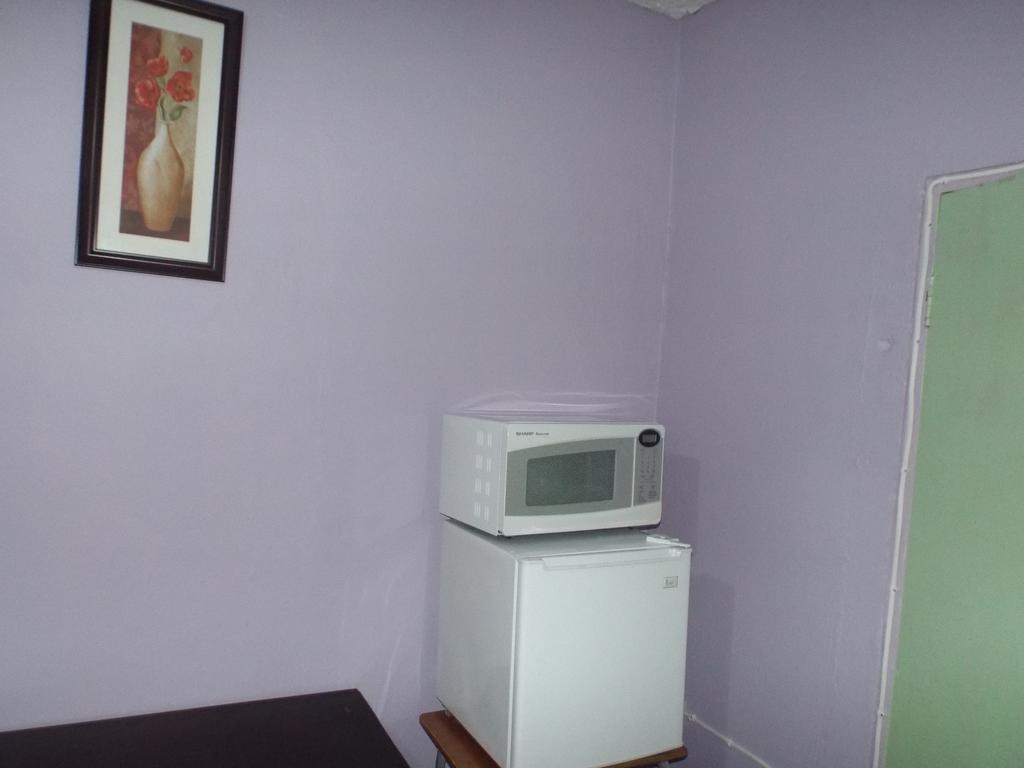 Tropical Court Inn New Kingston Rom bilde